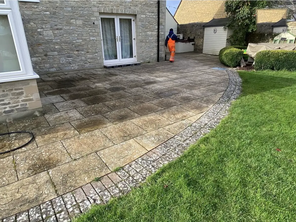 Patio cleaning by Geyserclean in Milton Keynes, work in progress