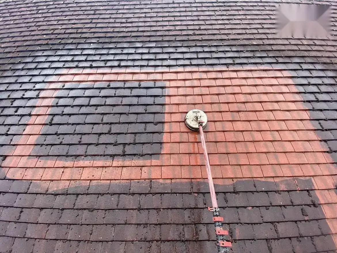 Roof cleaning by Geyserclean in Milton Keynes, work in progress